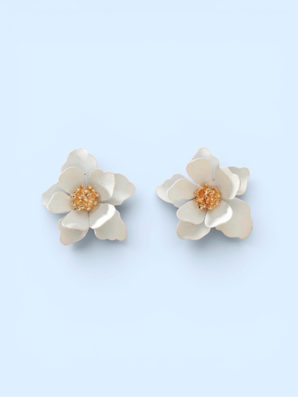White Flower Stud Earrings With Gold Accents half inch in length.